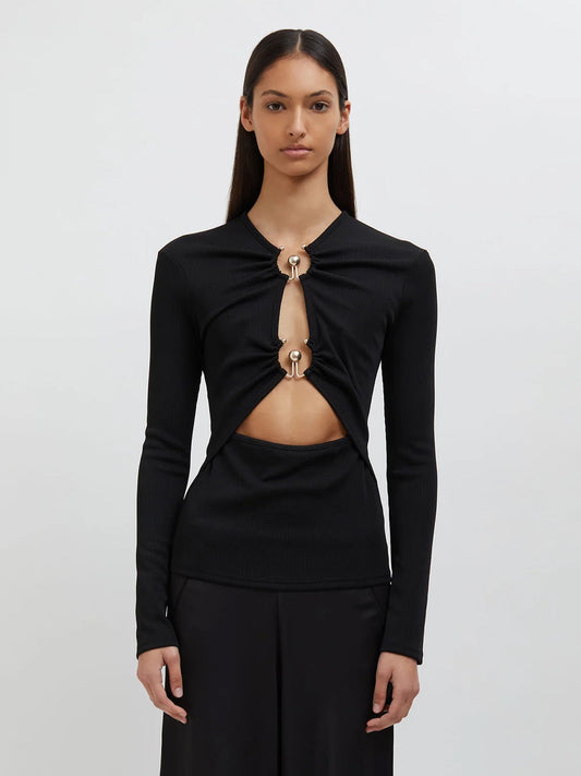 Image of a model wearing Tops. Productname: Christopher Esber Orbit Ruched Long Sleeve Top in Black colour by brand - Christopher Esber