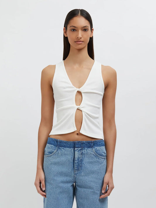 Image of a model wearing Tops. Productname: Christopher Esber Open Twist Tank in White colour by brand - Christopher Esber