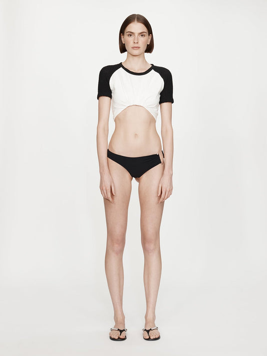 Image of a model wearing Tops. Product name - Tucked Ringer Jersey Tee in White colour by brand - CHRISTOPHER ESBER