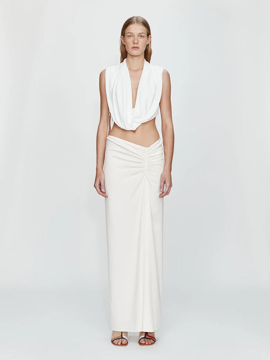 Image of a model wearing Skirts. Productname: CHRISTOPHER ESBER Side Ruched Skirt in White colour by brand - CHRISTOPHER ESBER