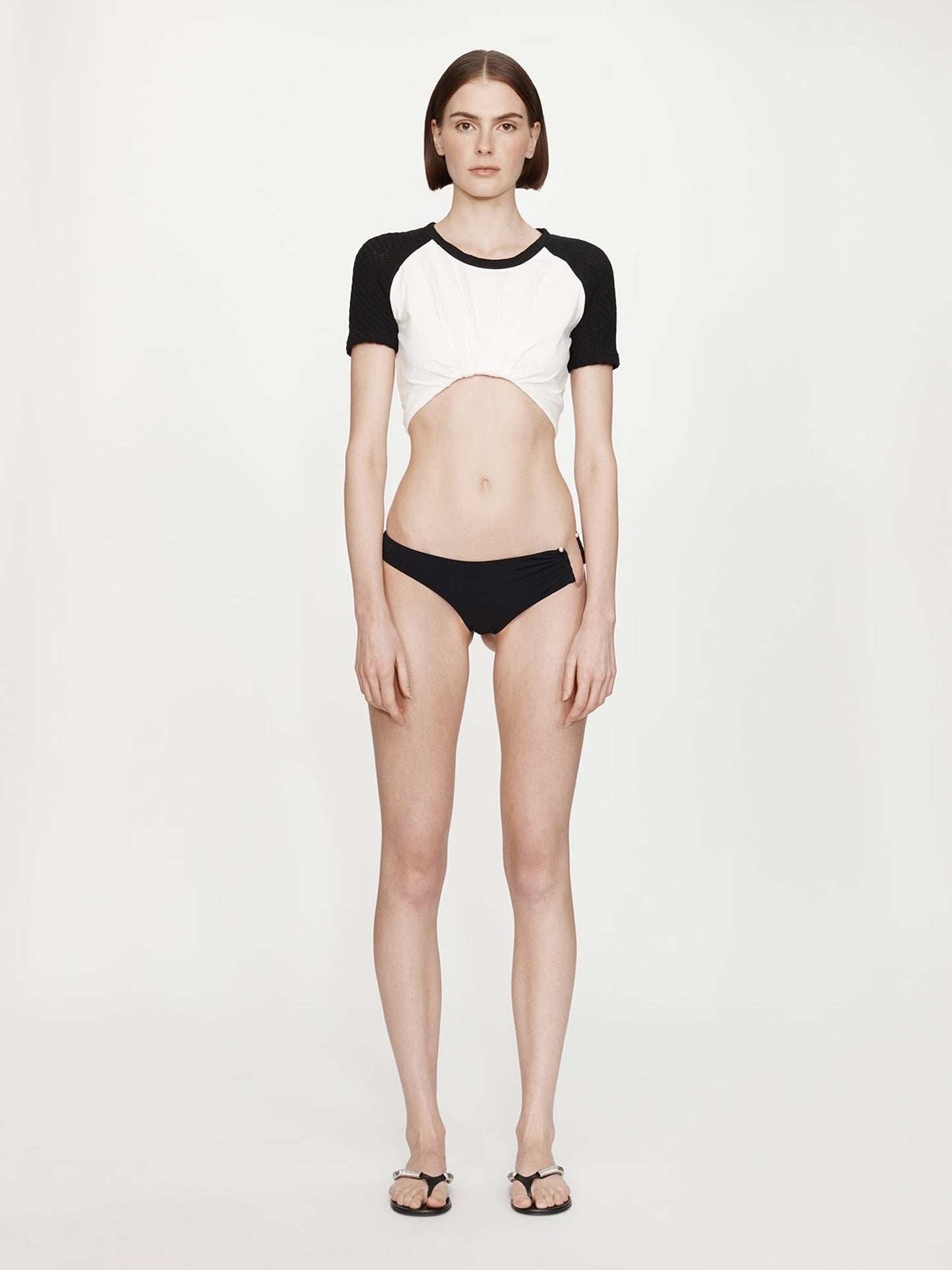 Image of a model wearing Tops. Product name - Tucked Ringer Jersey Tee in White colour by brand - CHRISTOPHER ESBER