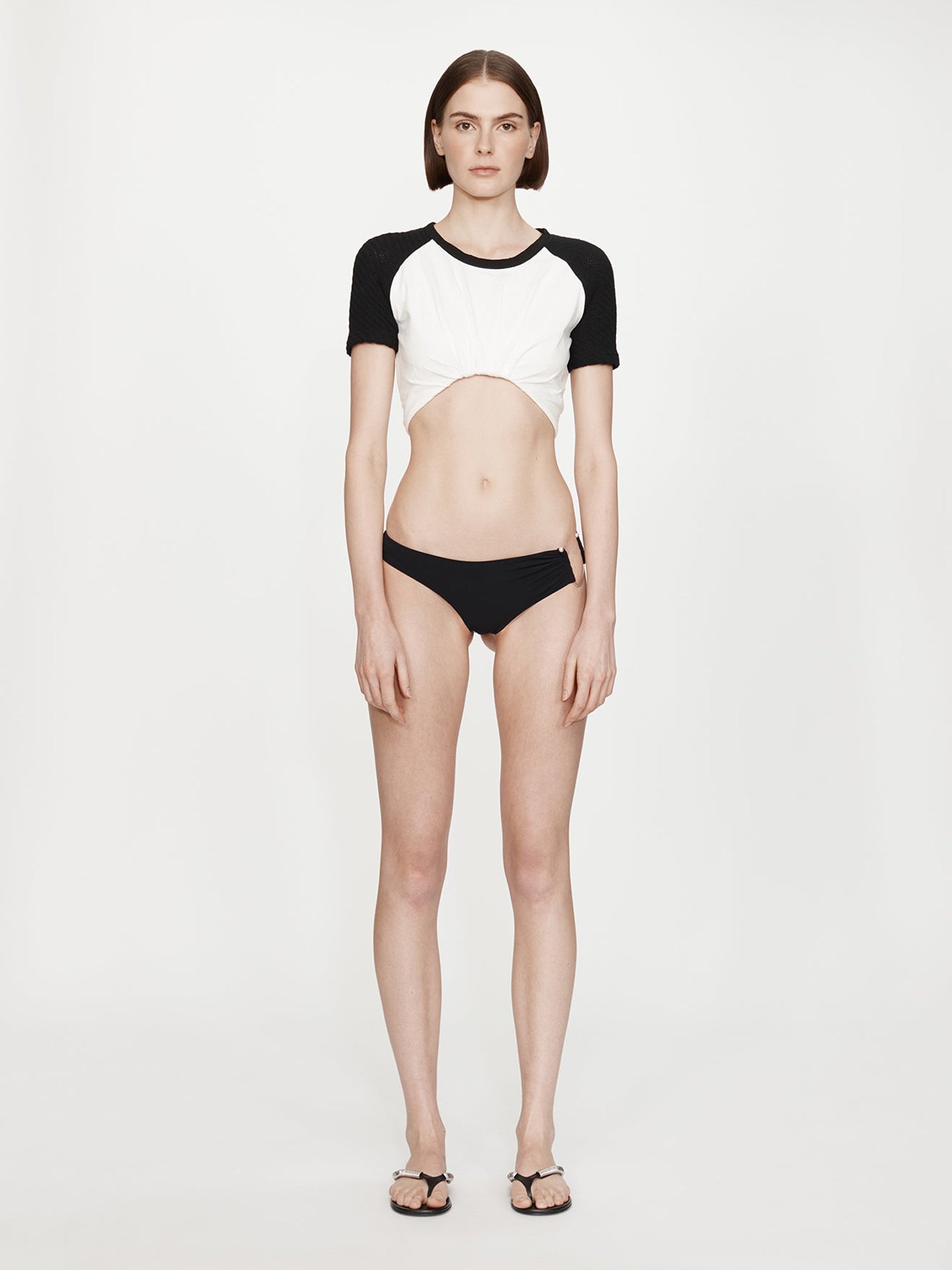 Image of a model wearing Tops. Product name - Tucked Ringer Jersey Tee in White colour by brand - CHRISTOPHER ESBER