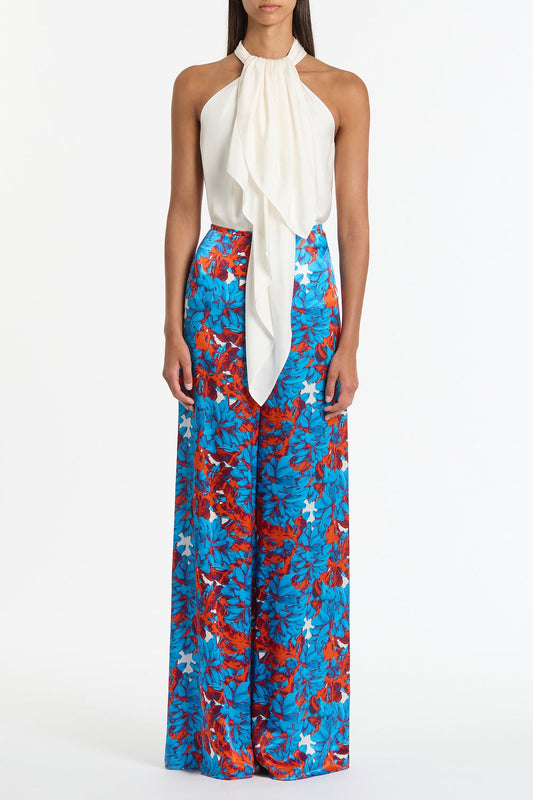 Image of a model wearing Pants. Product name - Impasto Print Silk Palazzo Pant in Multi colour by brand - Carla Zampatti