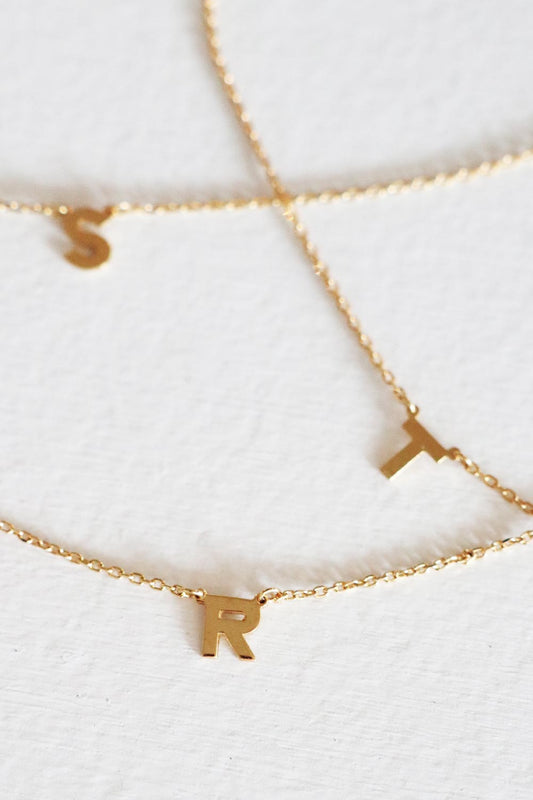 Image of Necklaces. Productname: Initial Letter Necklace Gold in Gold colour by brand - Kabana