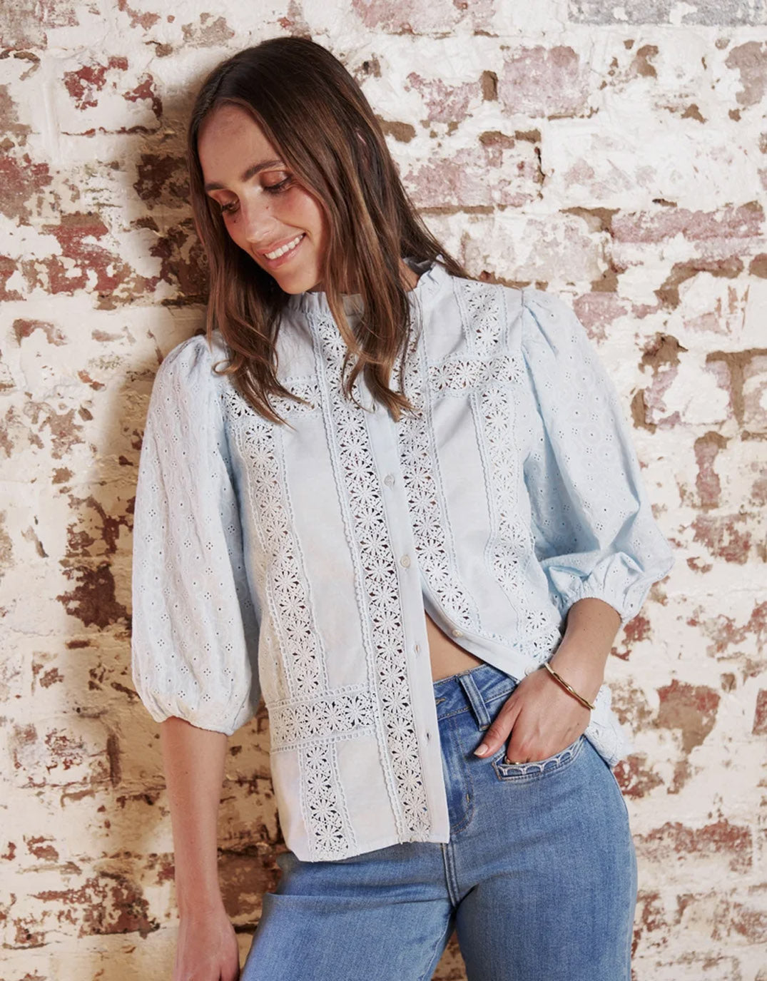 Image of a model wearing Tops. Product name - Isabella Shirt Powder Blue in Powder Blue colour by brand - Kireina