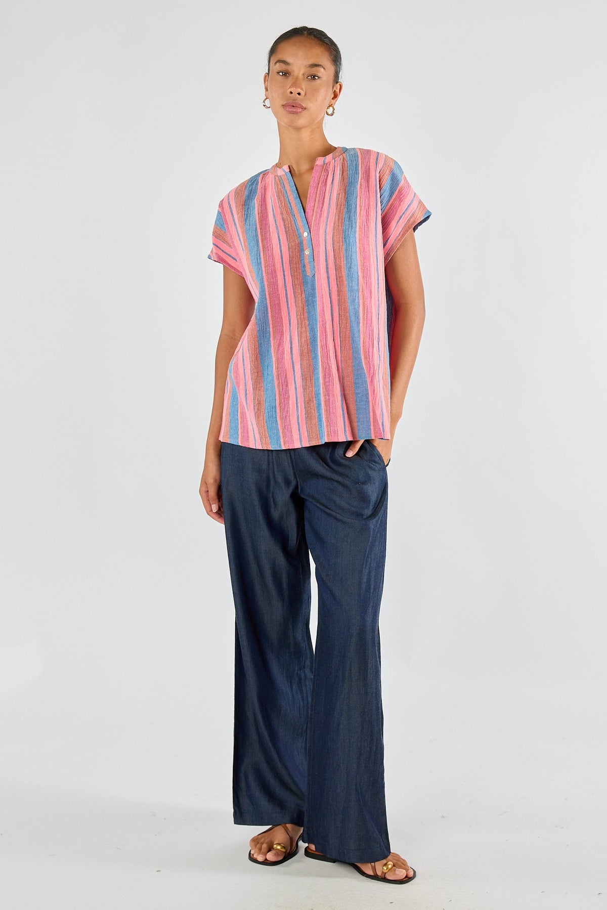 Image of a model wearing Tops. Product name - Itami Basque Top Blue in Blue colour by brand - Itami Division