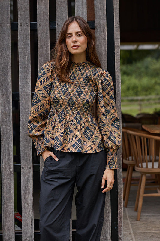 Image of a model wearing Tops. Productname: Itami Liv Top Tartan Latte in Tan colour by brand - Itami Division