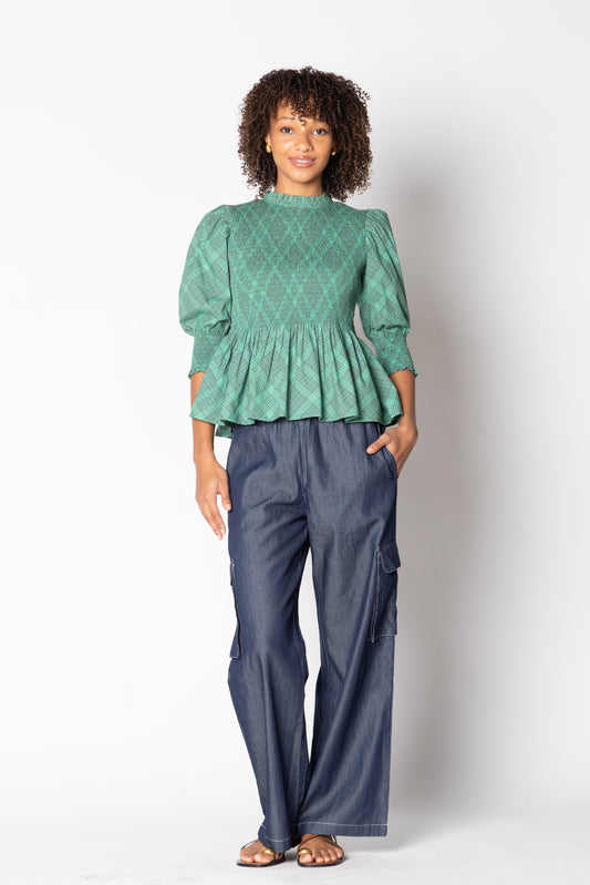 Image of a model wearing Tops. Productname: Itami Liv Top Tartan Green in Green colour by brand - Itami Division