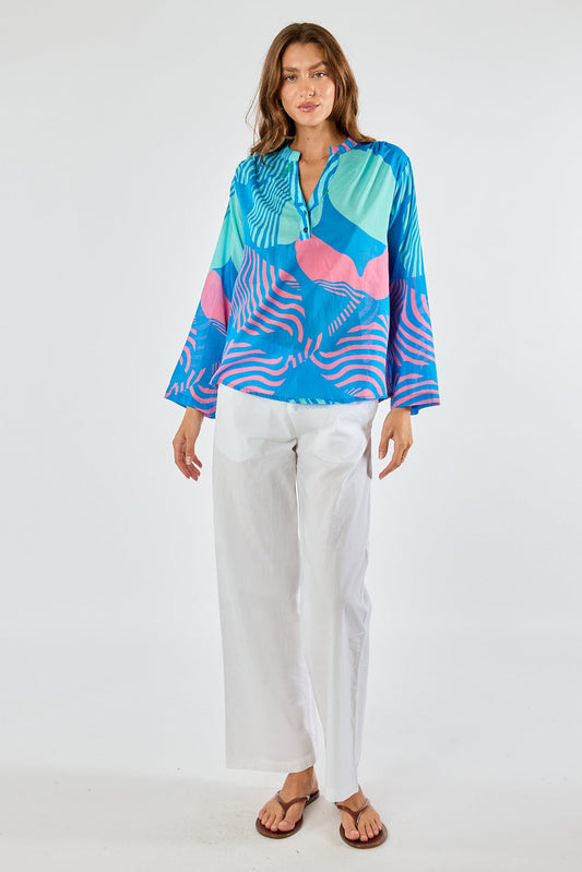 Image of a model wearing Tops. Product name - Itami Papillon LS Top Blue in Blue colour by brand - Itami Division