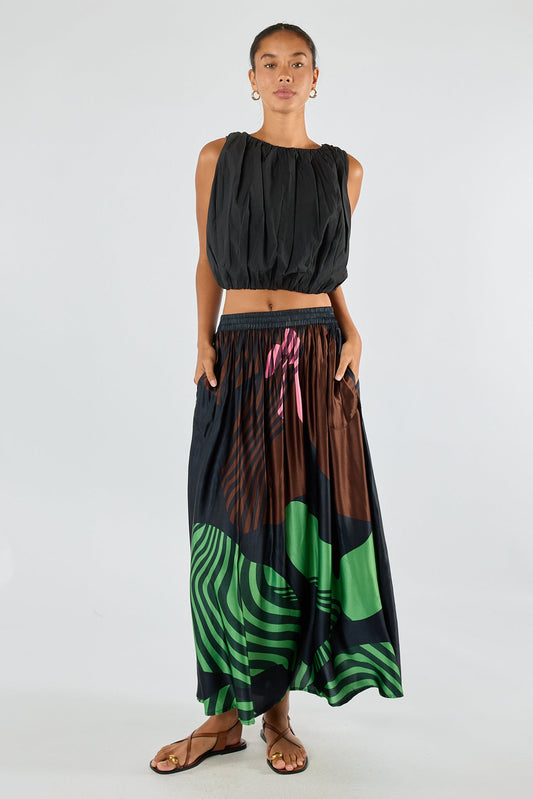 Image of a model wearing Skirts. Product name - Itami Papillon Skirt Black in Black colour by brand - Itami Division