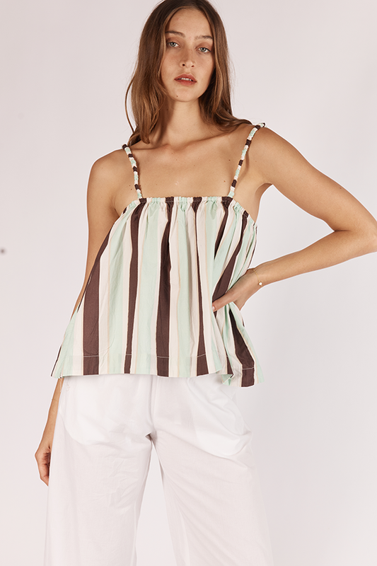 Image of a model wearing Tops. Productname: Itami Ratan Top Nomad Mint in Tan colour by brand - Itami Division