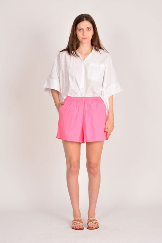 Image of a model wearing Shorts. Productname: Itami Short Pink in Pink colour by brand - Itami Division