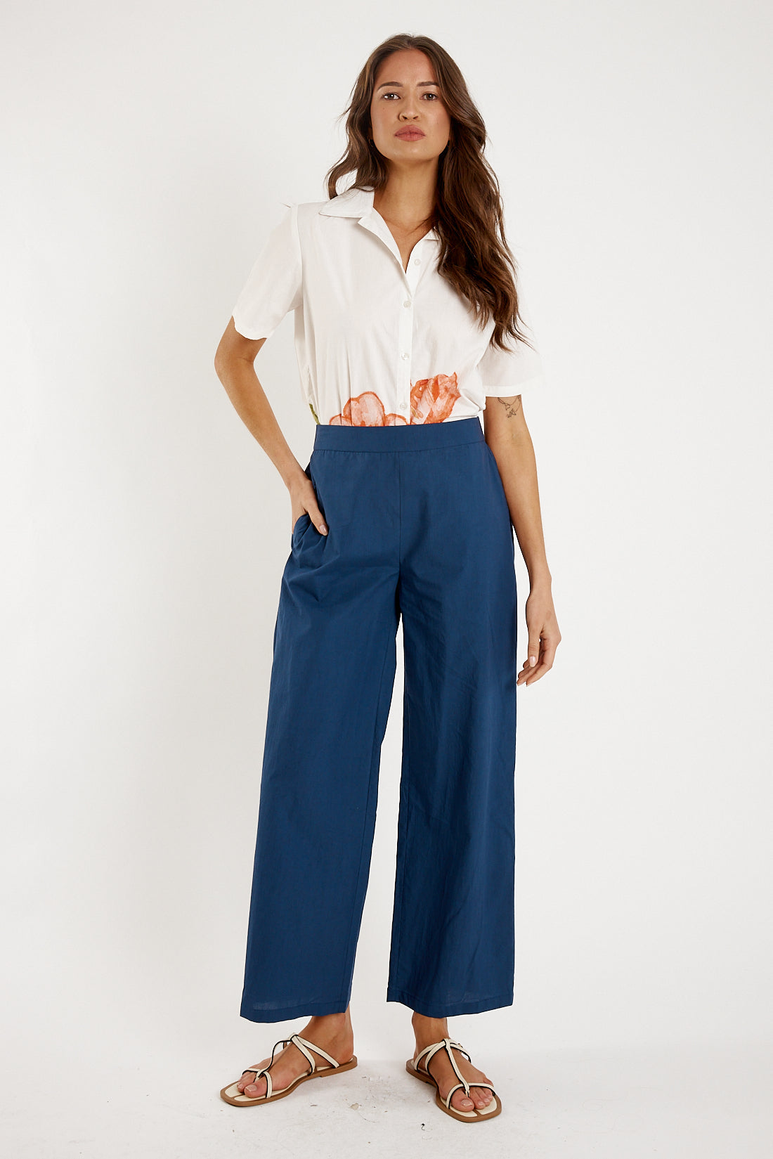 Image of a model wearing Pants. Productname: Itami Staple Pant Navy in Navy colour by brand - Itami Division