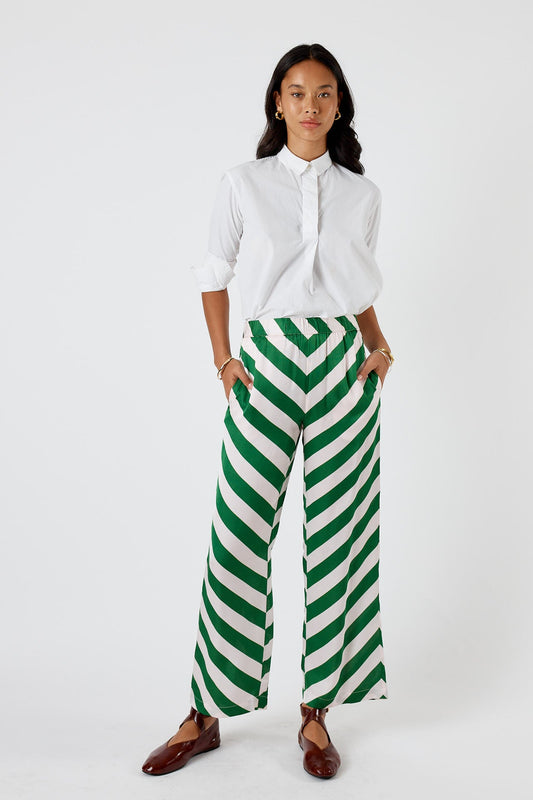 Image of a model wearing Pants. Product name - Itami Stripe Pant Olive in Olive colour by brand - Itami Division
