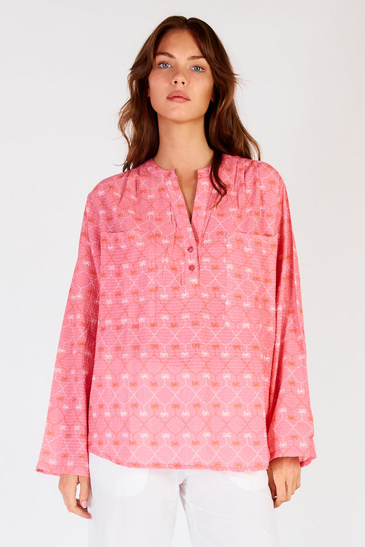 Image of a model wearing Tops. Productname: Itami Tiki Top Almera Pink in Pink colour by brand - Itami Division