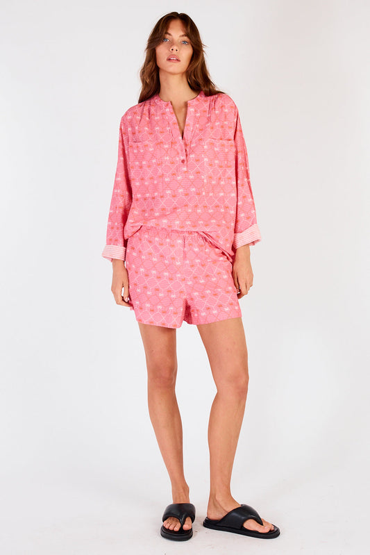 Image of a model wearing Shorts. Productname: Itami Pamplone Short Almera Pink in Pink colour by brand - Itami Division