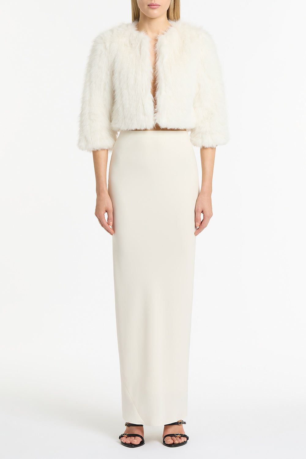 Image of a model wearing Skirts. Product name - Ivory Crepe Bias Skirt in Cream colour by brand - Carla Zampatti