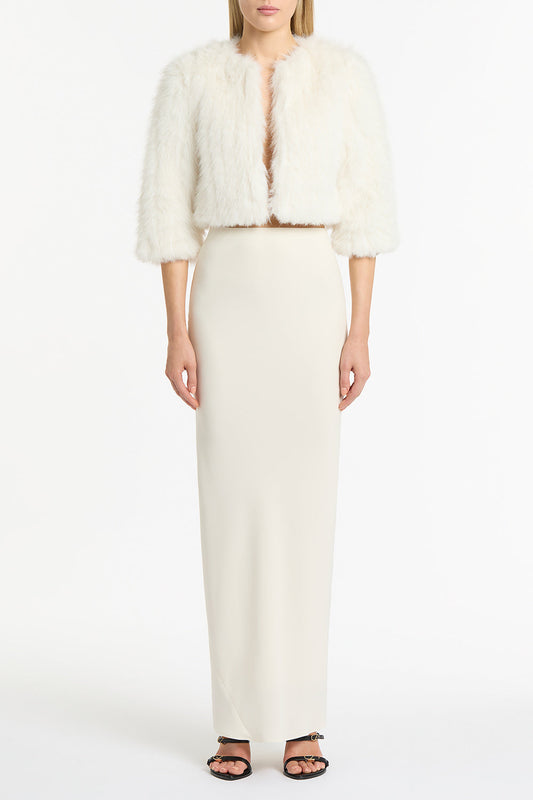 Image of a model wearing Skirts. Product name - Ivory Crepe Bias Skirt in Cream colour by brand - Carla Zampatti