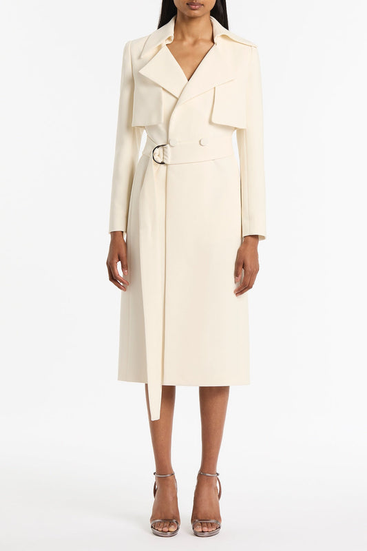 Image of a model wearing Outerwear. Product name - Ivory Crepe Double-Breasted Trench Coat in White colour by brand - Carla Zampatti