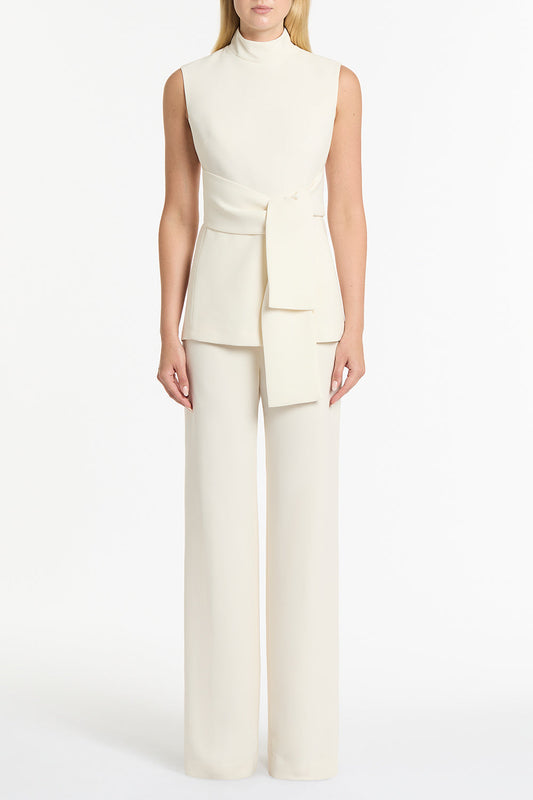 Image of a model wearing Pants. Product name - Ivory Crepe Wide Waisted Pant in Ivory colour by brand - Carla Zampatti