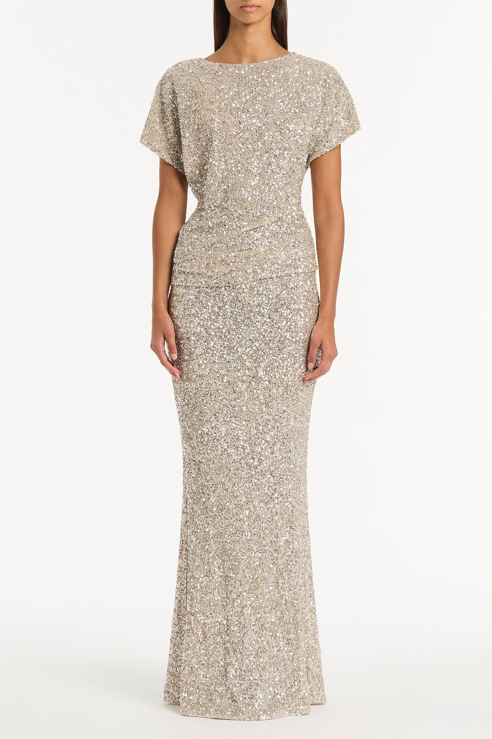 Image of a model wearing Skirts. Product name - Ivory Crushed Sequin Column Skirt in Silver colour by brand - Carla Zampatti