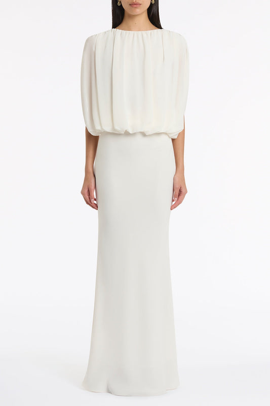 Image of a model wearing Tops. Product name - Ivory Georgette Gathered Capelet Top in Ivory colour by brand - Carla Zampatti