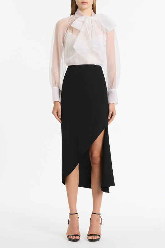 Image of a model wearing Tops. Product name - Ivory Organza Tie Blouse in White colour by brand - Carla Zampatti