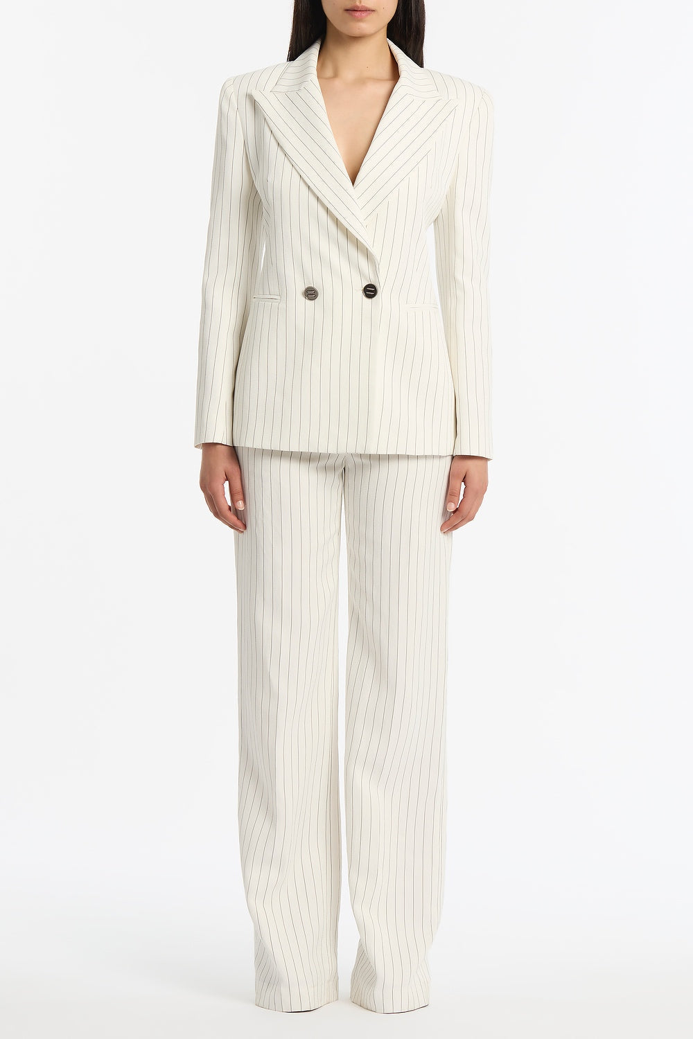 Image of a model wearing Pants. Product name - Ivory Pinstripe Linen Wide Leg Pant in Ivory colour by brand - Carla Zampatti
