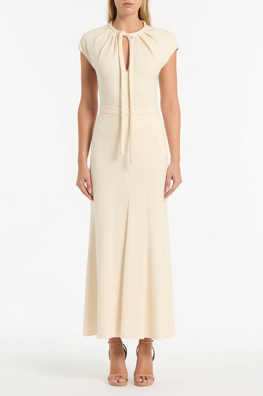 Image of a model wearing Tops. Product name - Ivory Ponte Tie Detail Top in Cream colour by brand - Carla Zampatti