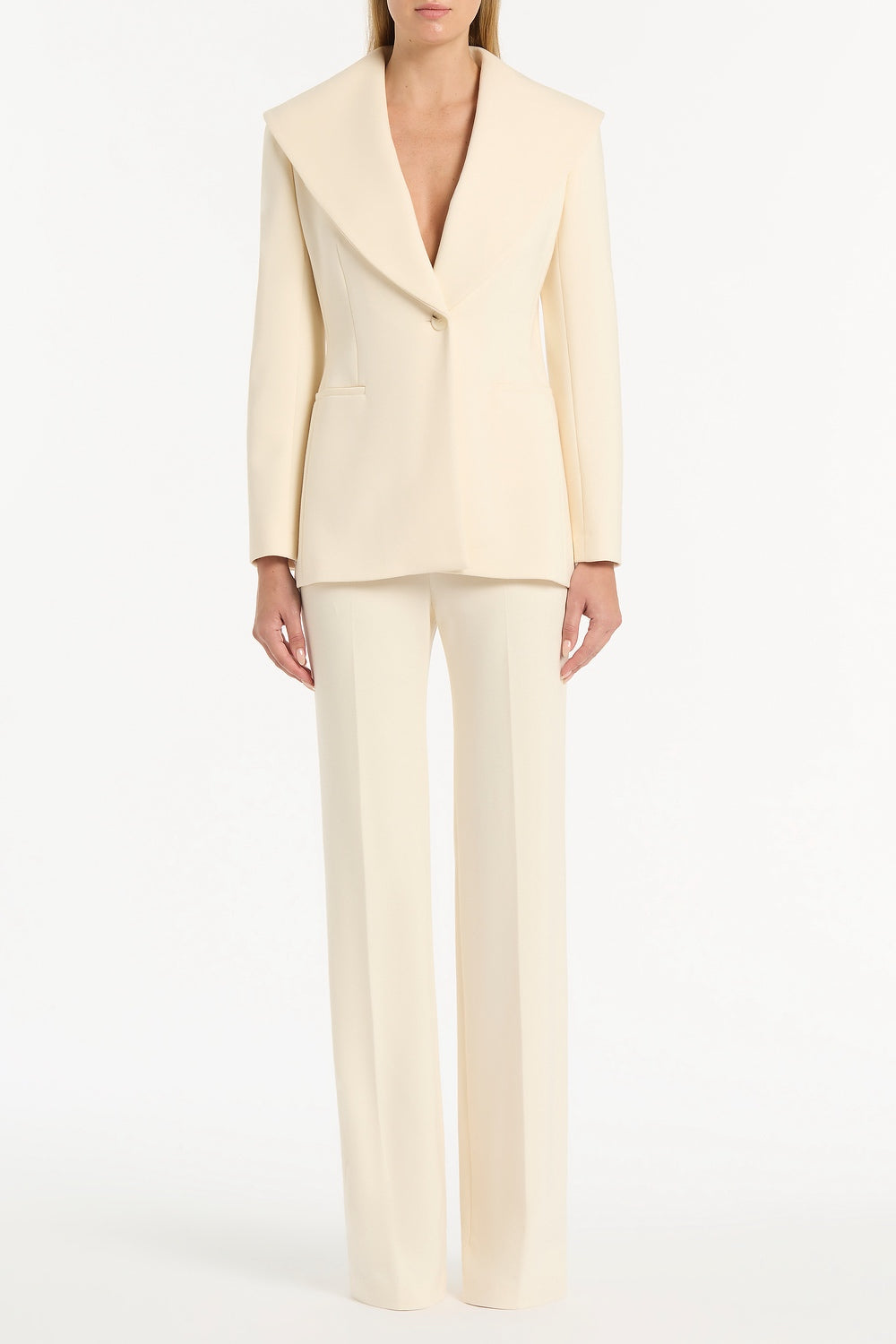 Image of a model wearing Pants. Product name - Ivory Ponte Wide Leg Pant in Cream colour by brand - Carla Zampatti