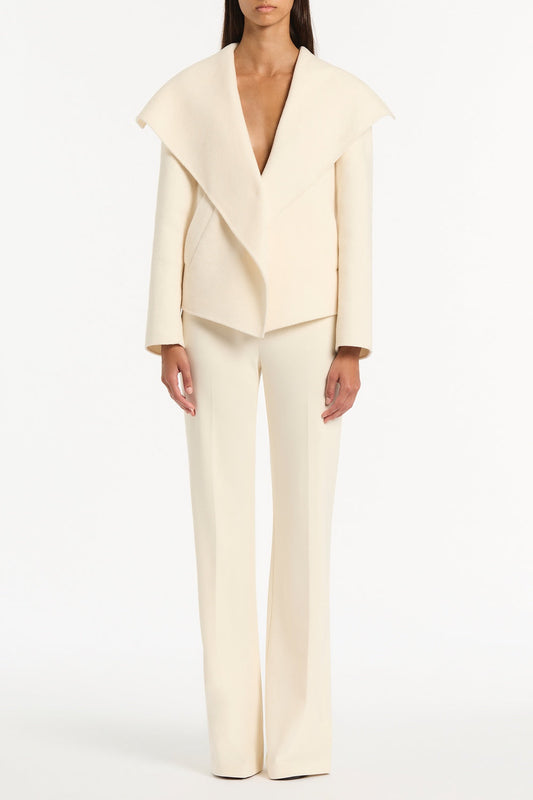 Image of Coats & Jackets. Product name - Ivory Wool Drape Front Jacket in White colour by brand - Carla Zampatti
