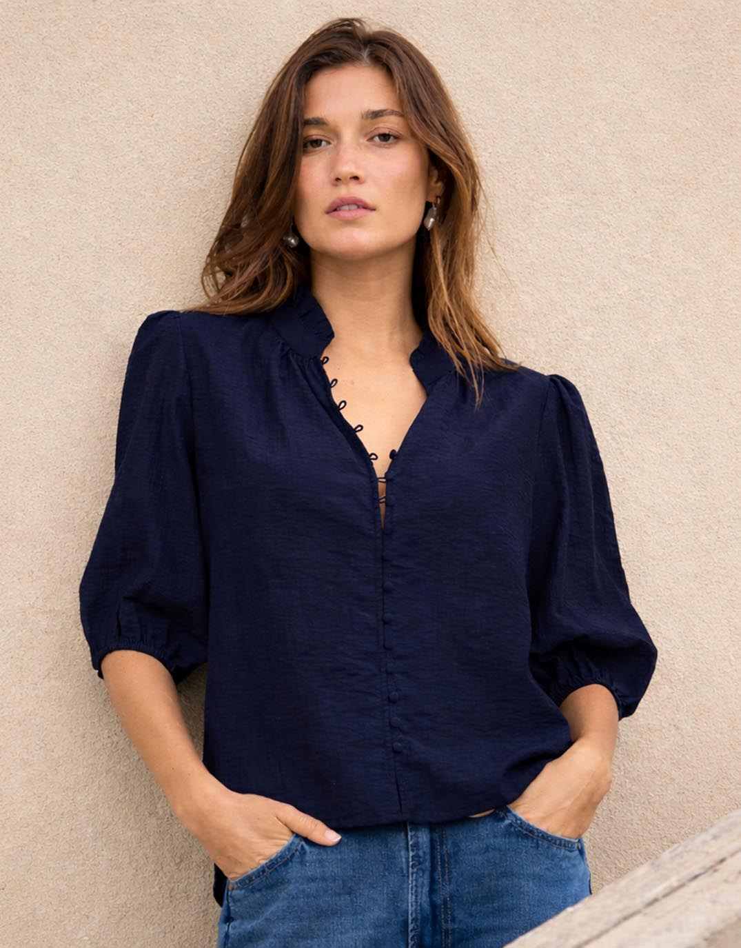Image of a model wearing Tops. Product name - Continuance Short Sleeve Top Navy in Navy colour by brand - Ivy & Jack