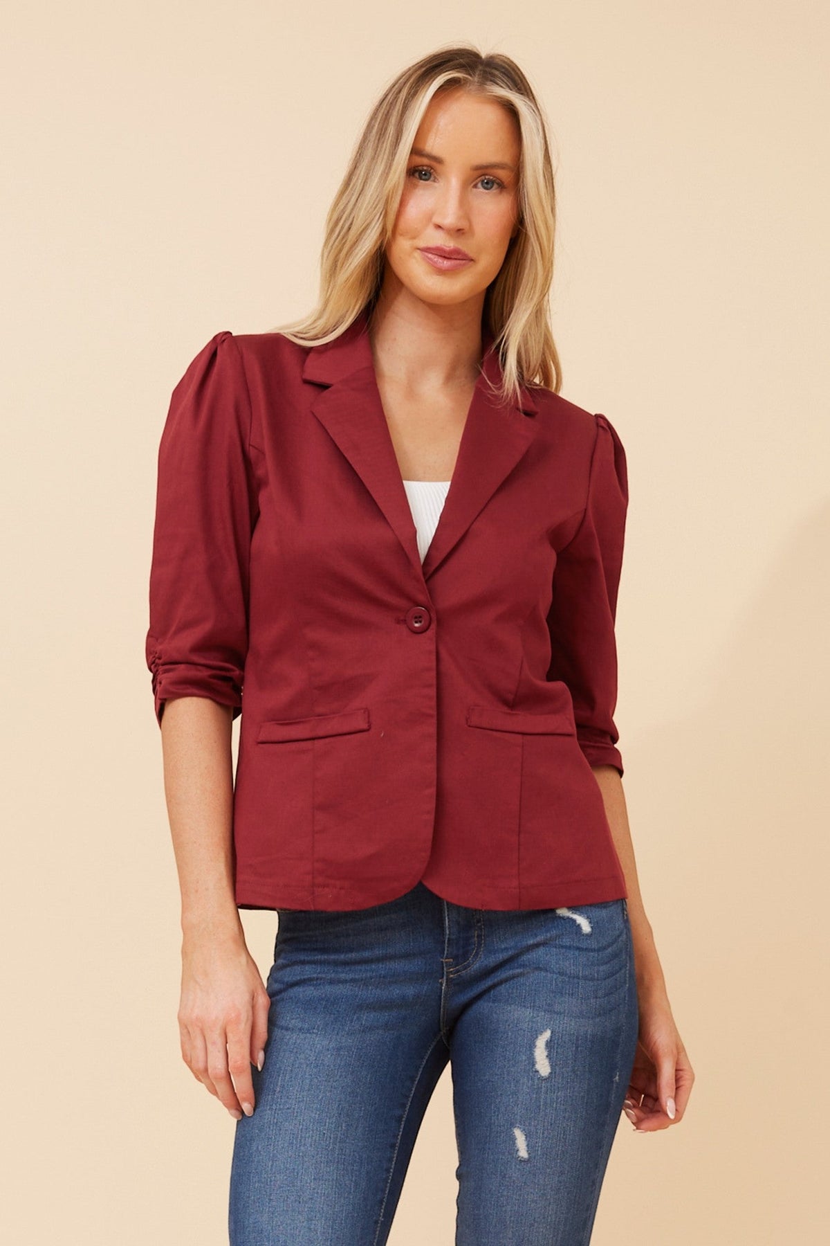 Image of a model wearing Outerwear. Product name - MILOS SOLID BLAZER in Black colour by brand - Caroline Morgan Australia