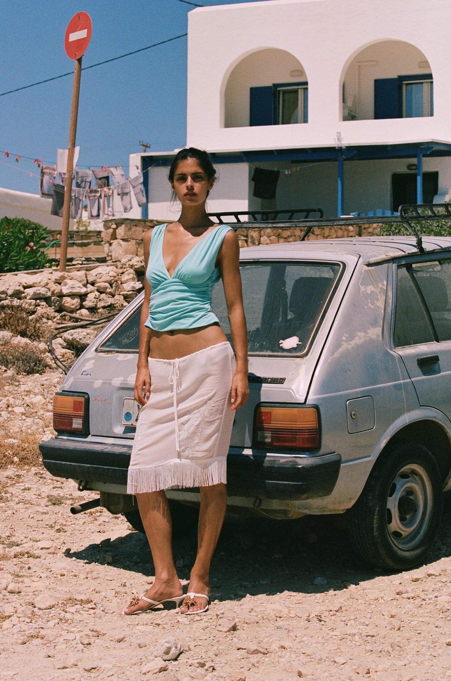 Image of a model wearing Tops. Product name - Jane Top in Aqua colour by brand - With Jéan