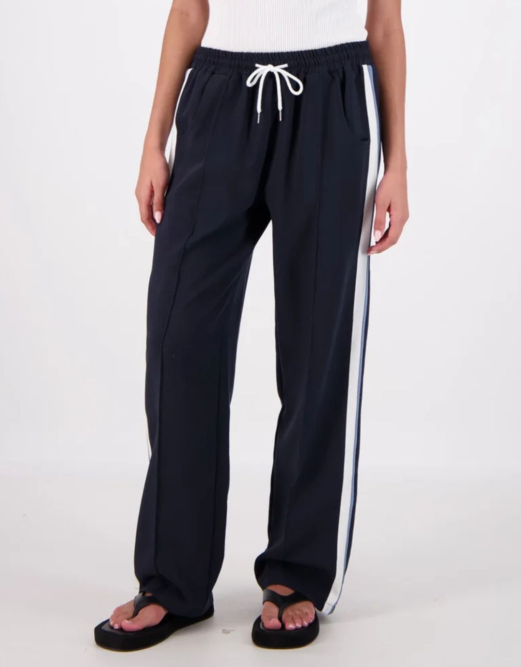 Image of a model wearing Pants. Productname: Cassis Trousers - in Navy colour by brand - Jasmine Alexa