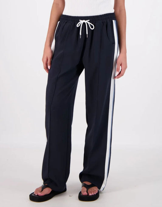 Image of a model wearing Pants. Productname: Cassis Trousers - in Navy colour by brand - Jasmine Alexa