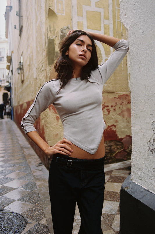 Image of a model wearing Tops. Product name - Joy Top in Stone colour by brand - With Jéan