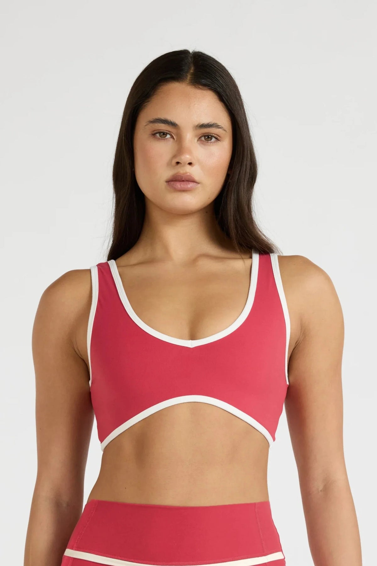 Image of Activewear. Product name - ALLFENIX CloudCore Hi Lo Sports Bra in Berry colour by brand - All Fenix