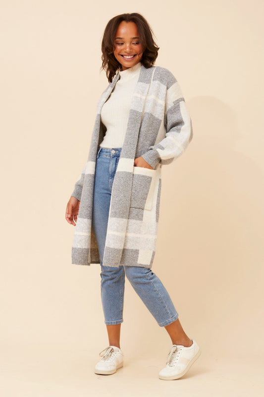 Image of a model wearing Tops. Product name - MAVEN CHECKED PRINT KNIT COATIGAN in Multi Grey colour by brand - Caroline Morgan Australia