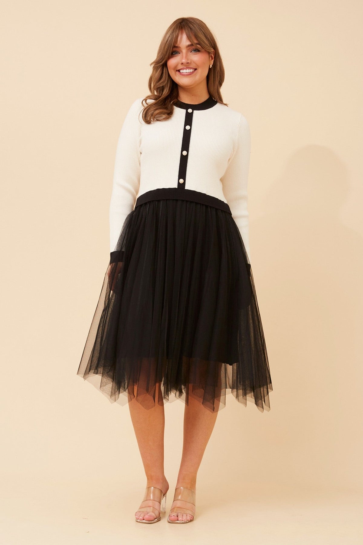 Image of Dresses. Product name - BRENNA KNIT DRESS in Black And White colour by brand - Caroline Morgan Australia