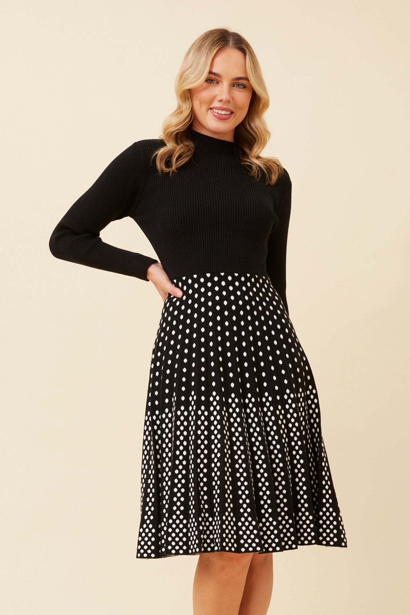 Image of Dresses. Product name - ELINA FIT AND FLARE KNIT DRESS in Black colour by brand - Caroline Morgan Australia