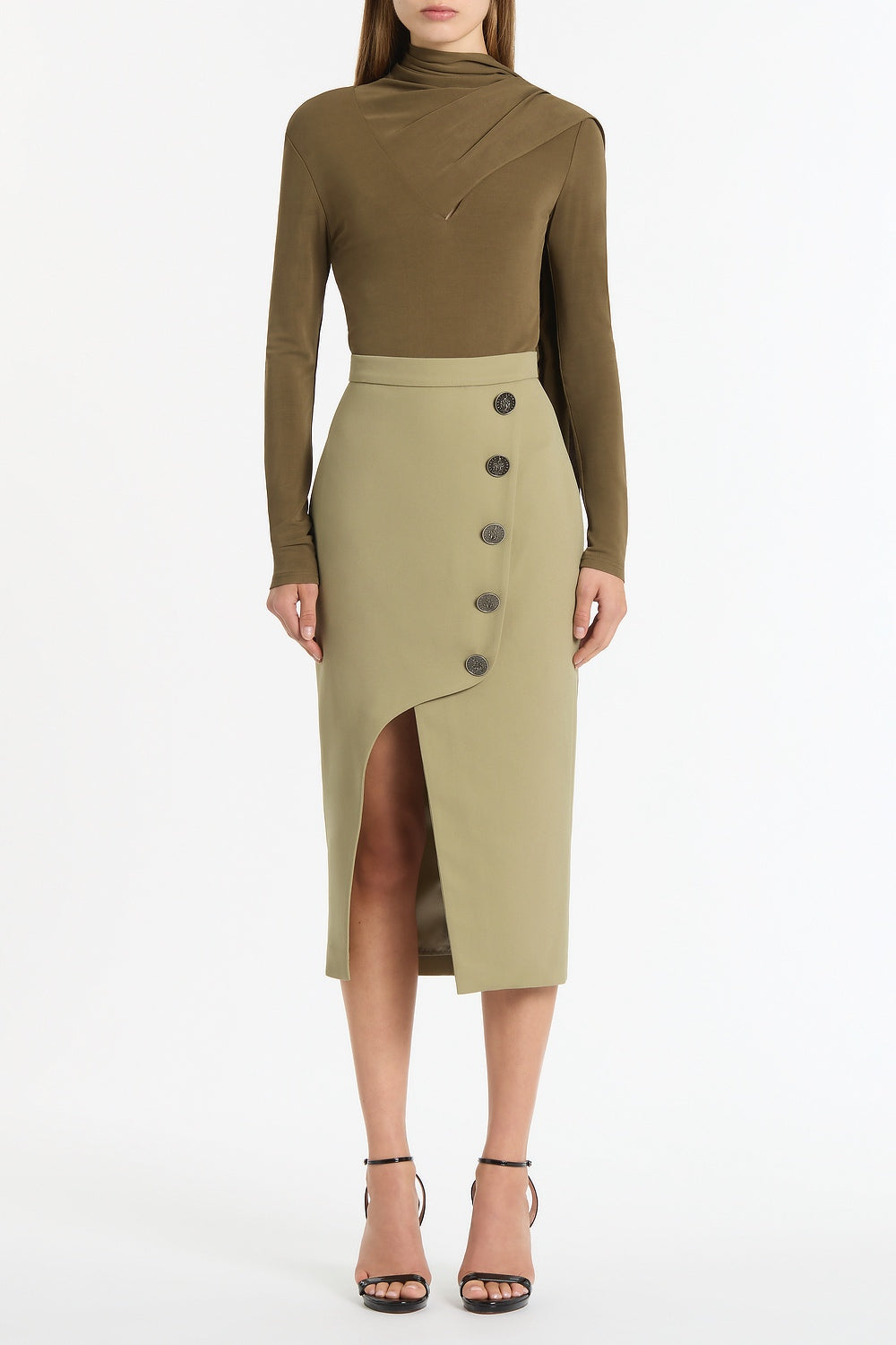 Image of a model wearing Skirts. Product name - Kelp Crepe Moneta Skirt in Green colour by brand - Carla Zampatti