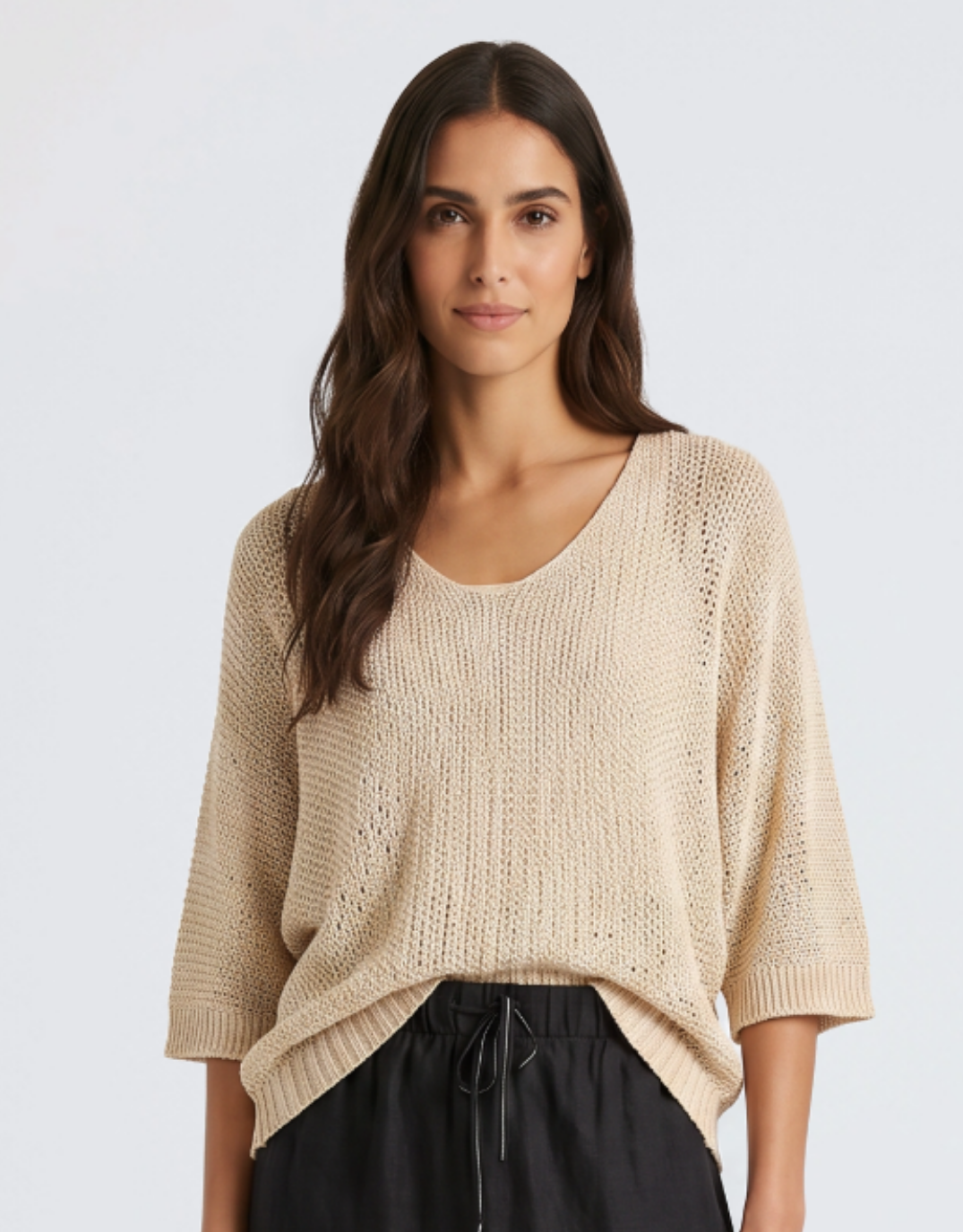 Image of a model wearing Outerwear. Product name - Knit Sweater Beige in Beige colour by brand - Urban Luxury