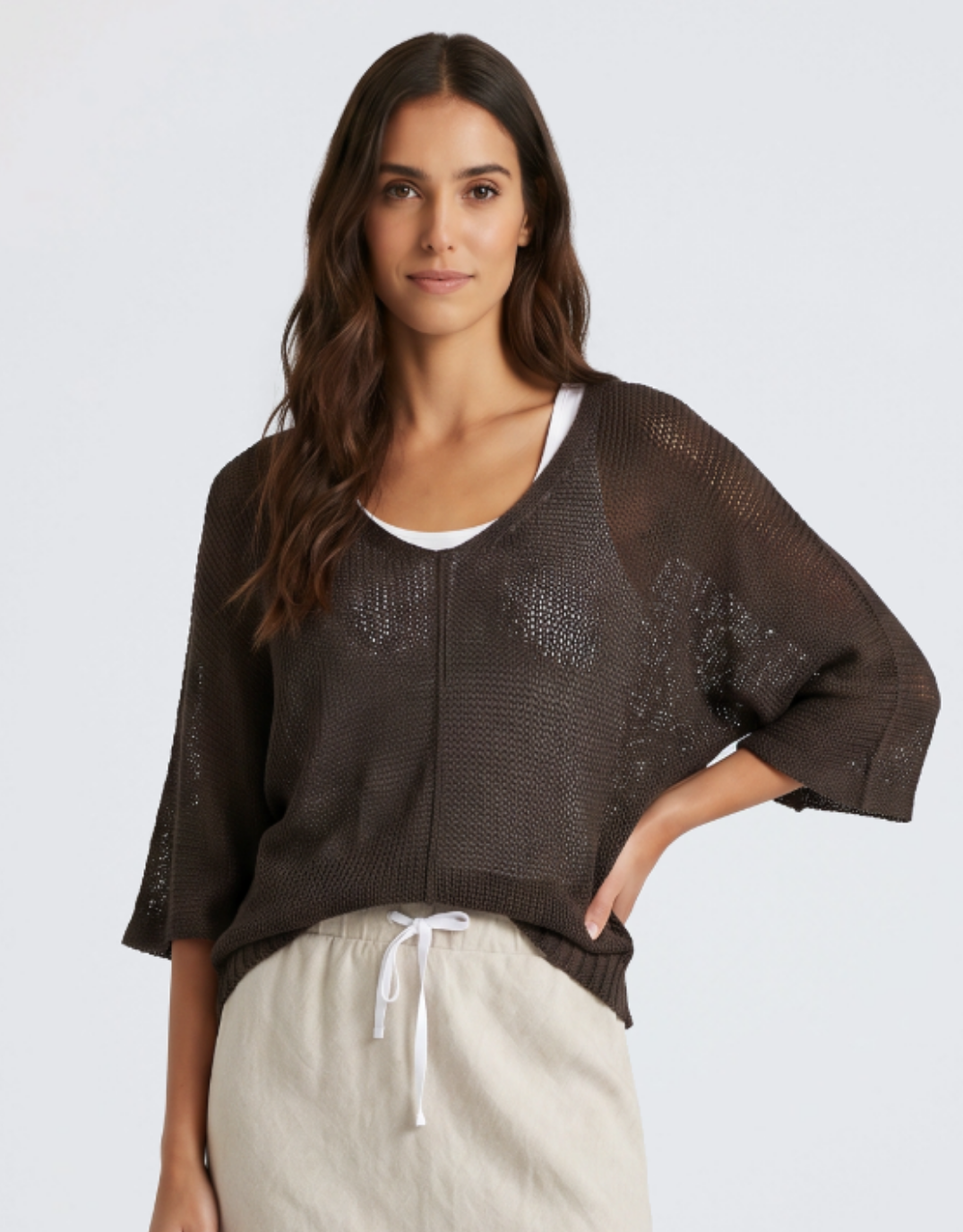 Image of a model wearing Outerwear. Product name - Knit Sweater Chocolate in Chocolate colour by brand - Urban Luxury