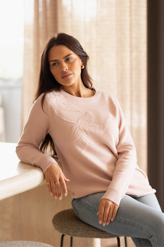 Image of a model wearing Outerwear. Product name - ANITA FLORAL EMBROIDERED PULLOVER in Teal colour by brand - Stella