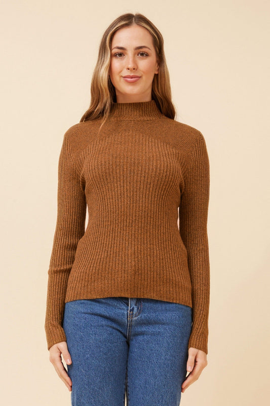 Image of a model wearing Outerwear. Product name - JUNE SOLID KNIT JUMPER in Ginger Bread colour by brand - Caroline Morgan Australia