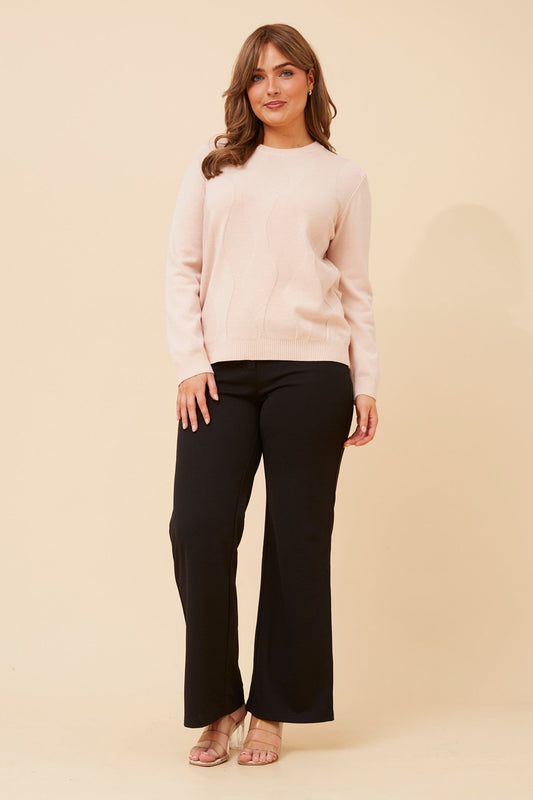 Image of a model wearing Outerwear. Product name - ANGIE KNIT PULLOVER in Beige colour by brand - Caroline Morgan Australia