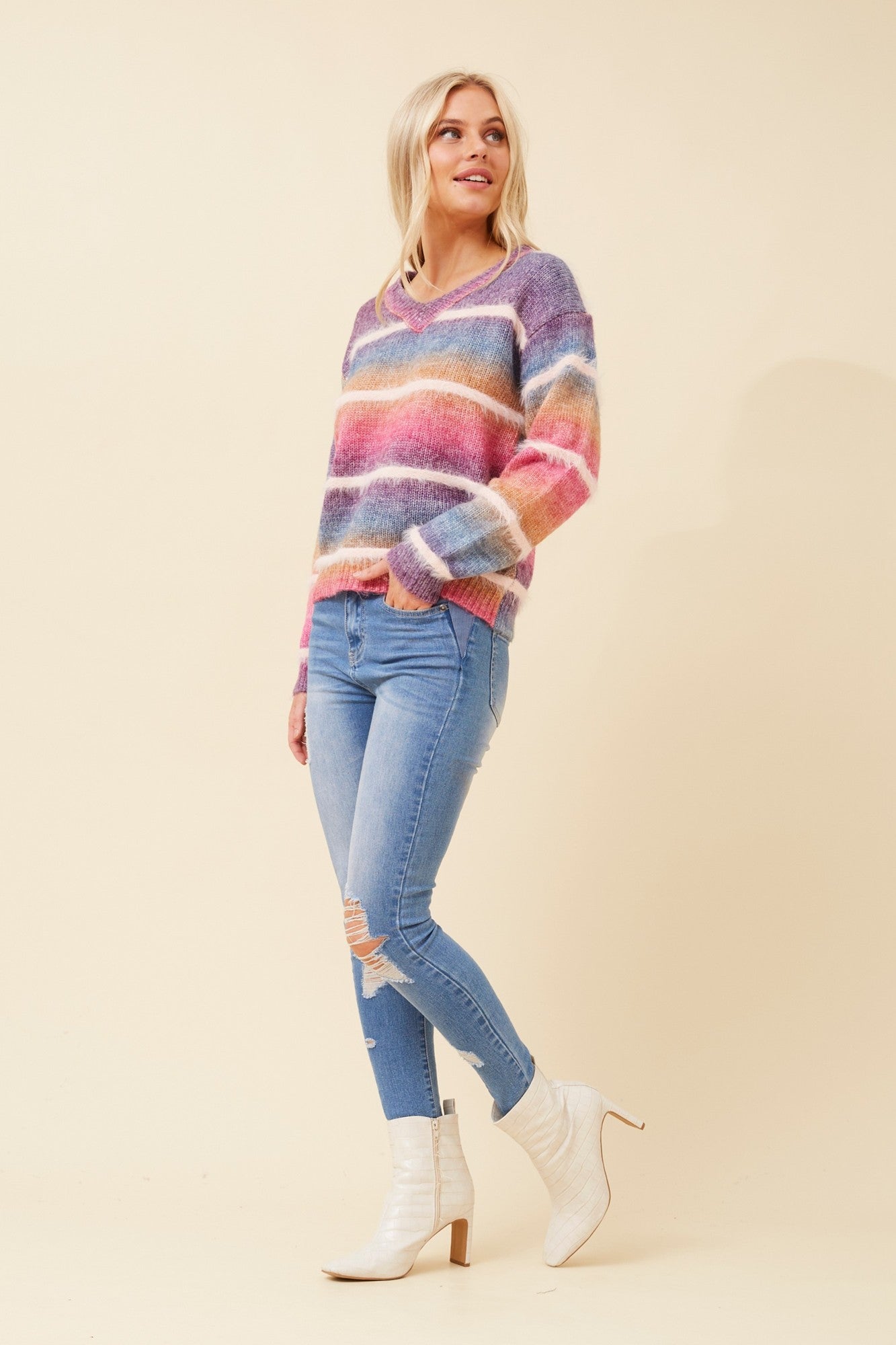 Image of a model wearing Outerwear. Product name - DILARA STRIPE KNIT PULLOVER in Multi Grey colour by brand - Caroline Morgan Australia