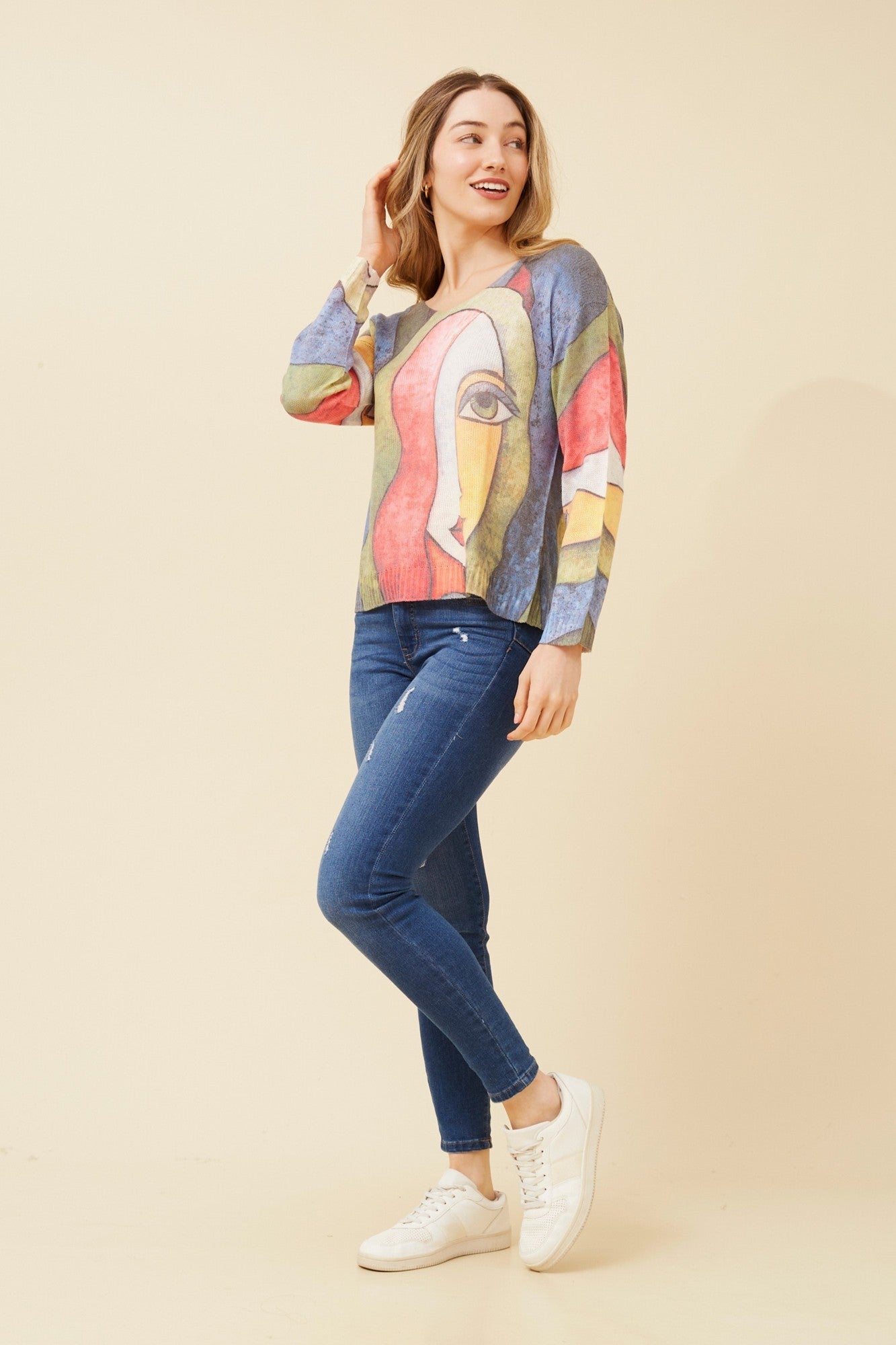 Image of a model wearing Tops. Product name - NEAVE ABSTRACT PRINT KNIT TOP in Multi Blue colour by brand - BOTTEGA MODA