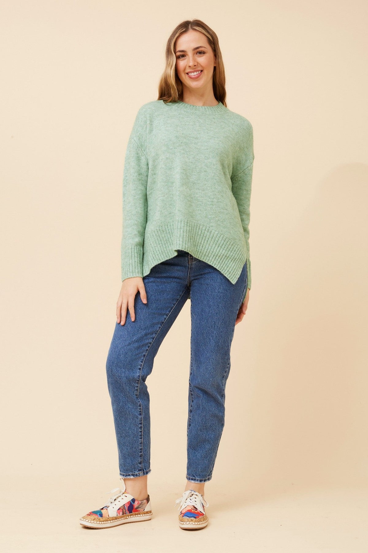 Image of a model wearing Outerwear. Product name - KAMARI WOOL BLEND KNIT PULLOVER in Mint colour by brand - Caroline Morgan Australia